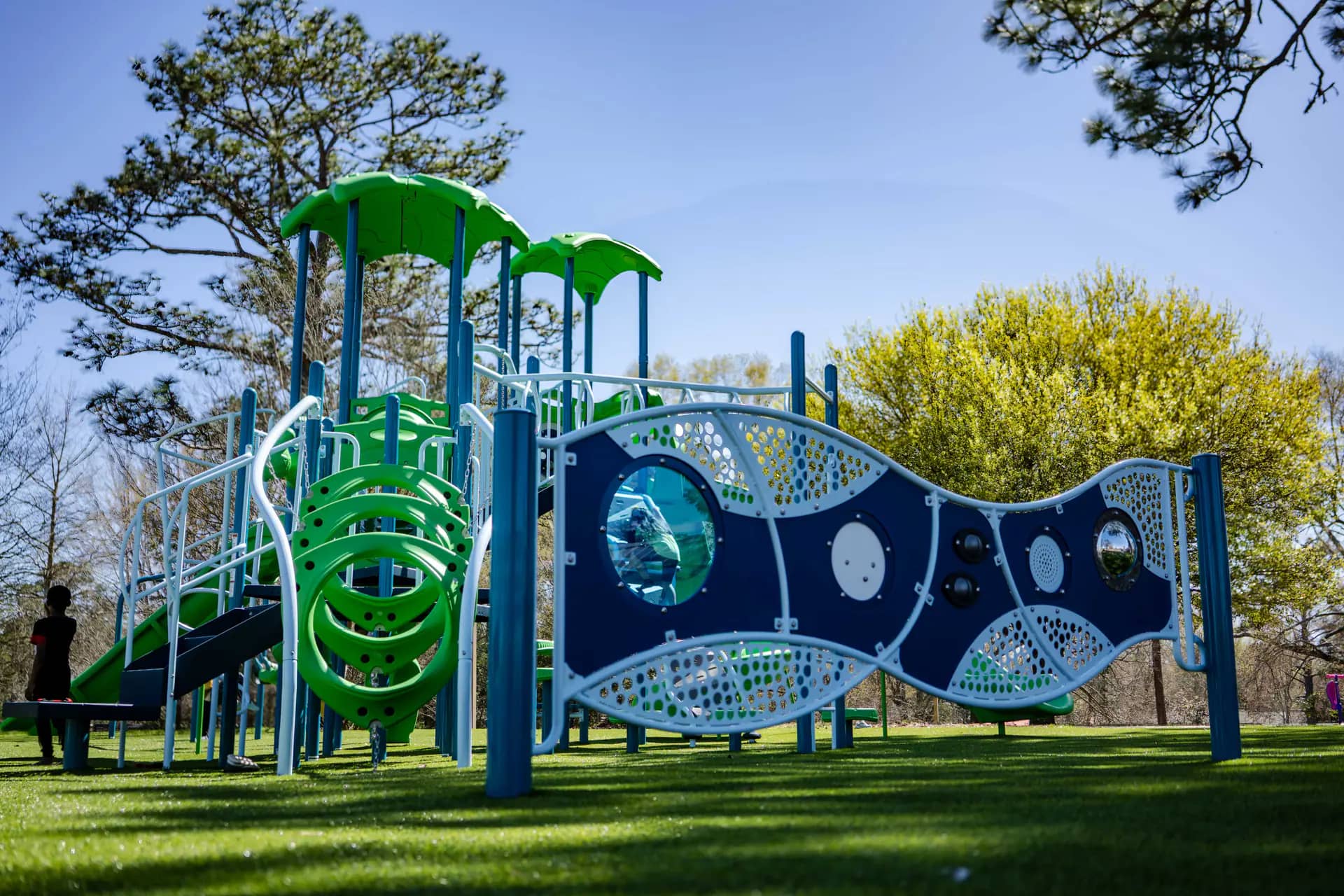 Families gathered at Vernon Dahmer Park playground reopening