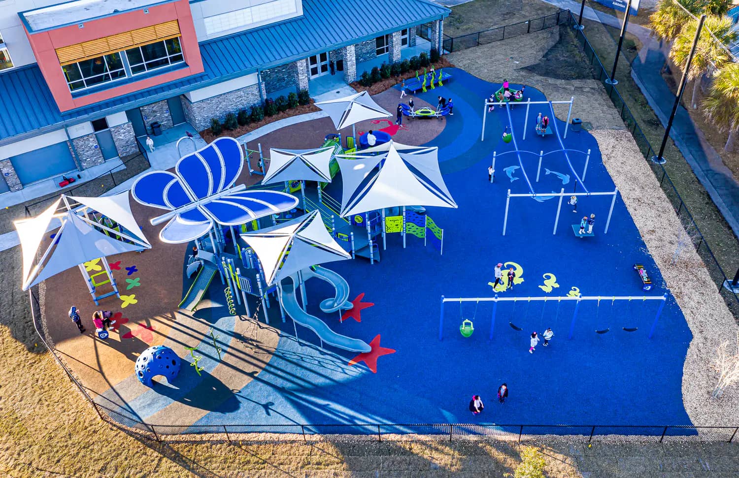 Inclusive playground structures at Gregory's Playground at Island Rec