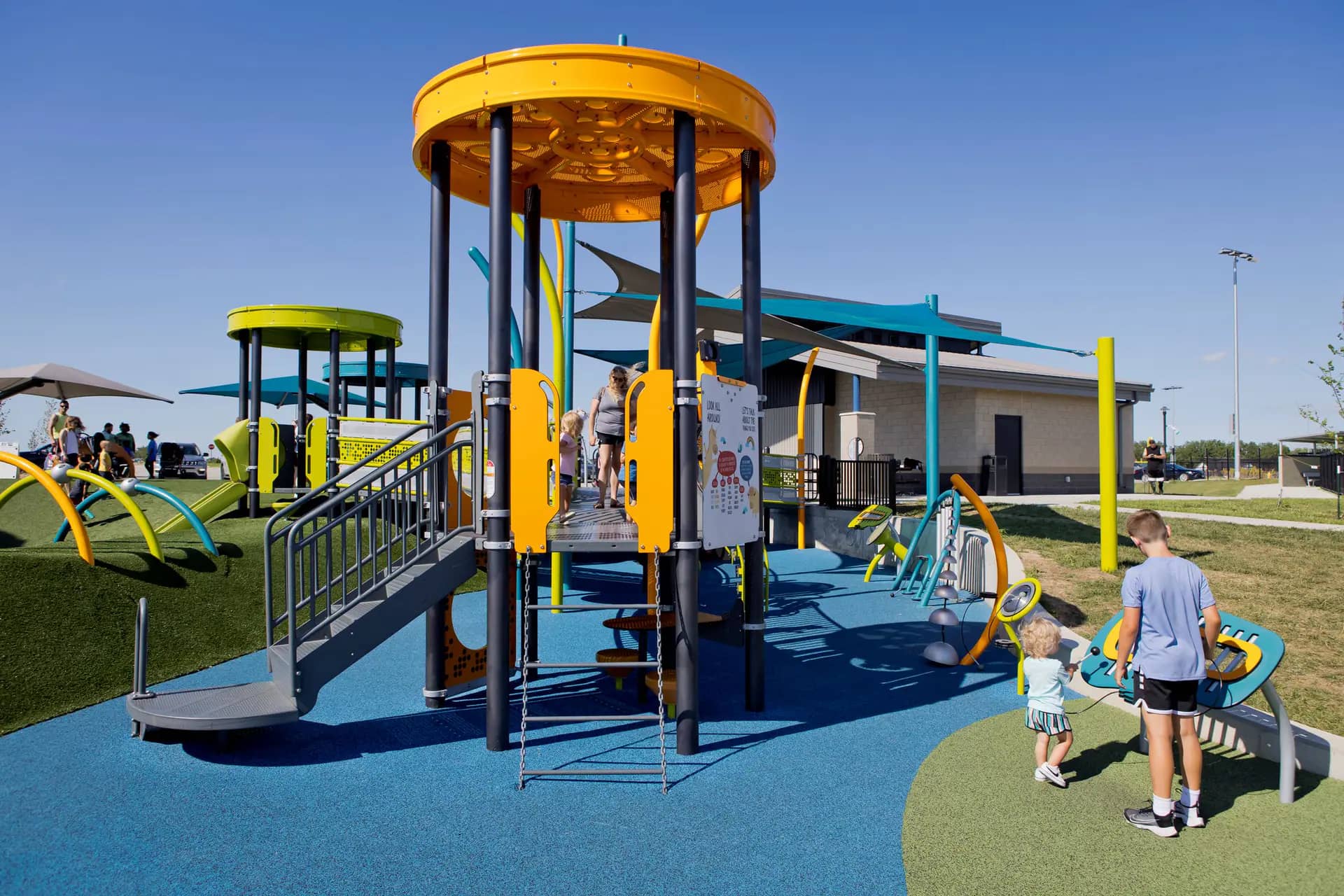 Children using the music station near the younger kids' area