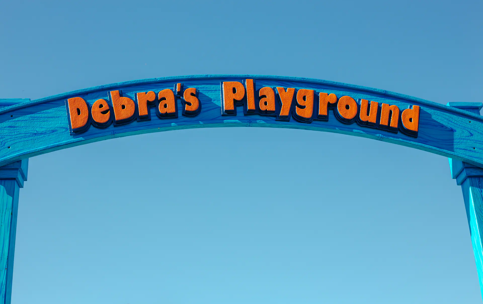 Debra's Playground sign at Central Creek Park