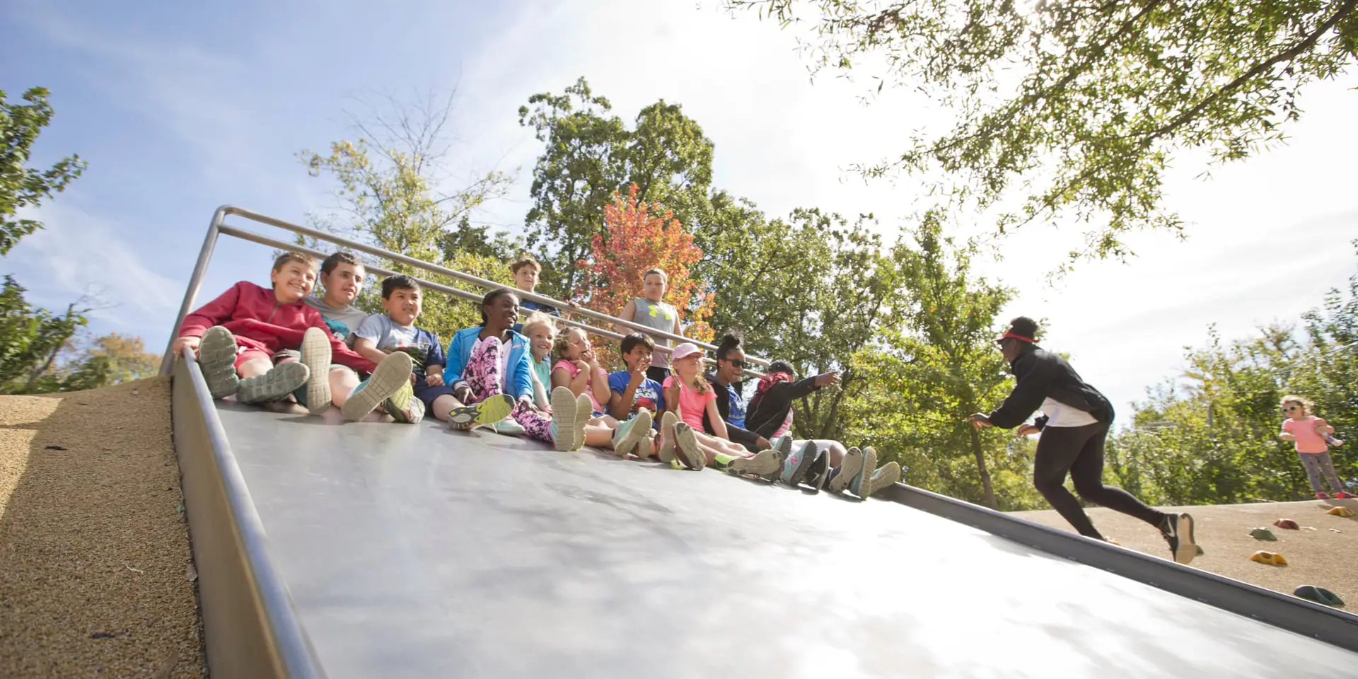 Children's play structures at Woodland Discovery Playground in Shelby Farms Park