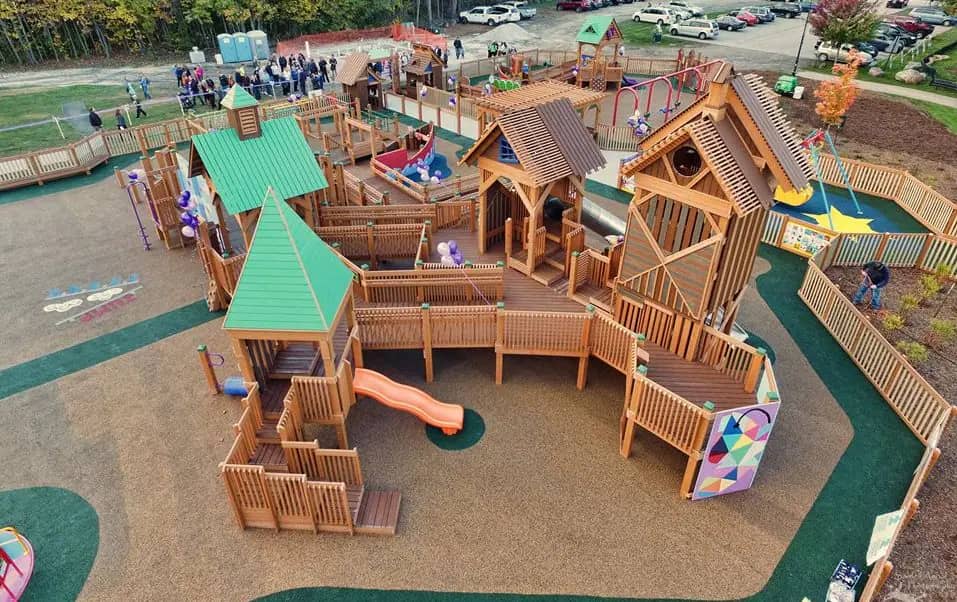 Aerial view of Kayla's Playground showing the fenced inclusive play areas and pavilion in Franklin