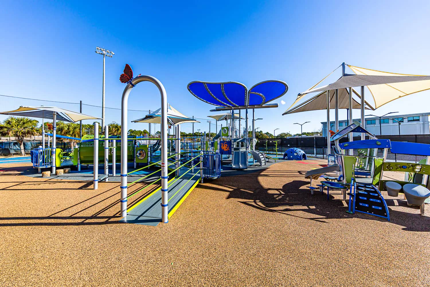 Inclusive spinner and surrounding accessible surfacing