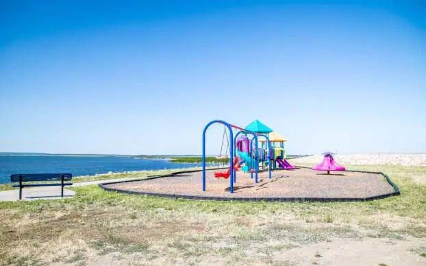 Accessible lakeside park and pier area in Devils Lake.
