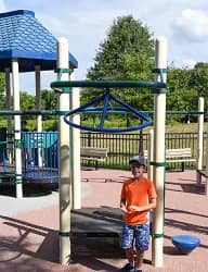 Accessible play structures at Challenger Place playground in Dorbrook Recreation Area