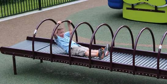 Ground-level play feature at Woodridge Park