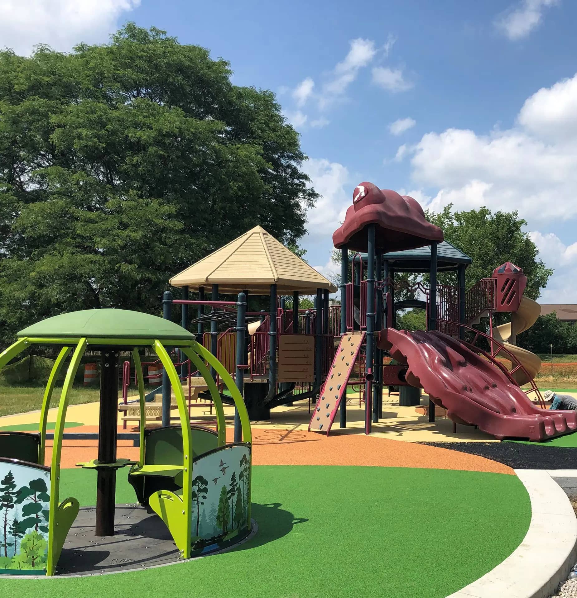 Inclusive We-Go-Round at Heritage Park North Pavilion playground in Canton