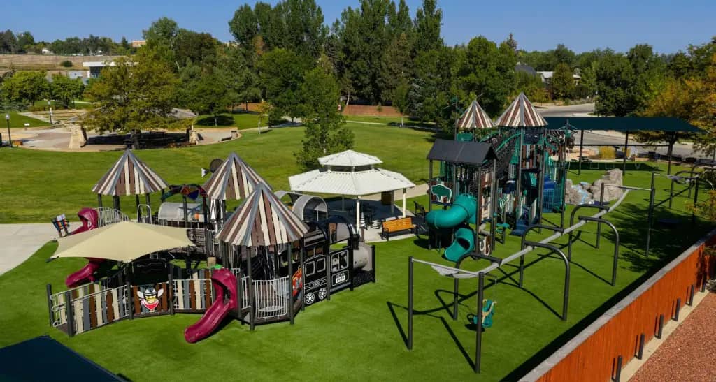 Whitney Commons East Park Playground in Sheridan with inclusive modern play equipment