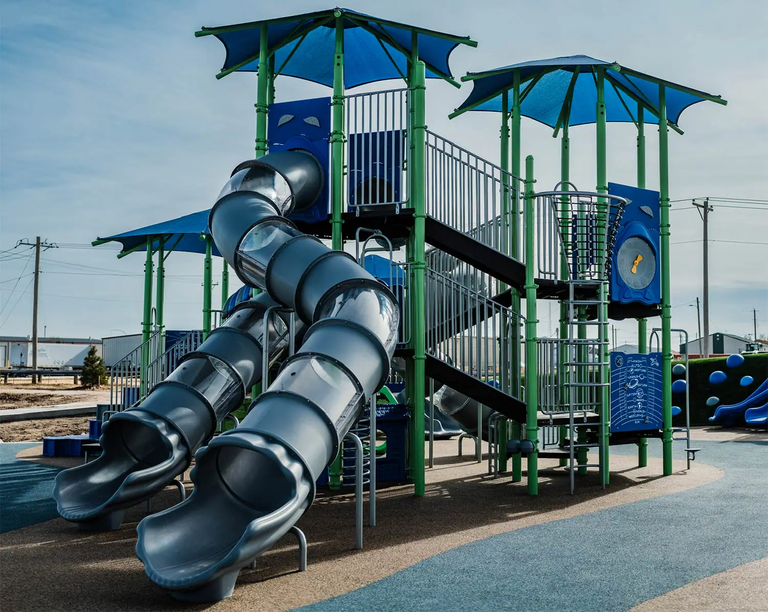 Playground at Bob Halloran Community Park in Garden City with large structure, hill play, and modern surfacing