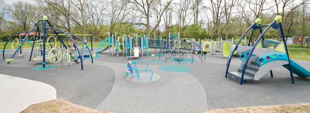 Inclusive playground structures and rubber surfacing at Independence Park in Greenwood