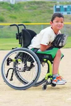 Child using adaptive recreation equipment as featured on Missoula's all-abilities programming page.