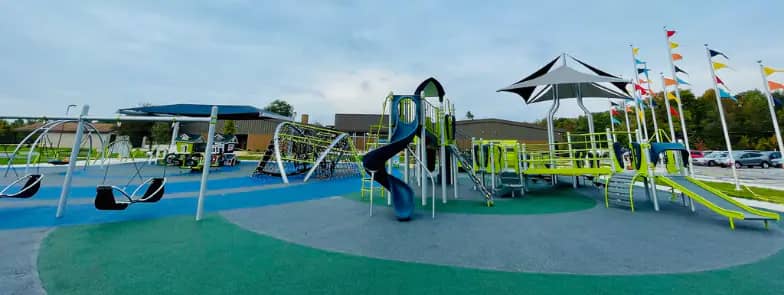 Marimor Legacy Park and Playground in Lima with large blue and green play structure