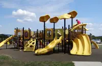 Boundless Playground play structure at Twin Lakes Park Peach Plaza Expansion Area